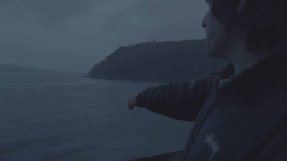 A scene beside the water from Letting Go.